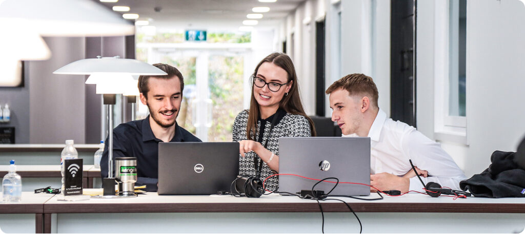 Photograph of three people working together at The Innovation Centre, Sci-Tech Daresbury